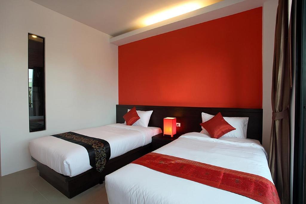 Karon Sino House Otel Oda fotoğraf